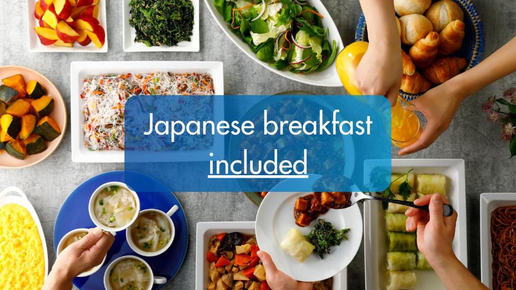 a table full of food with the words japanese breakfast included at Toyoko Inn Chubu International Airport No1 in Tokoname