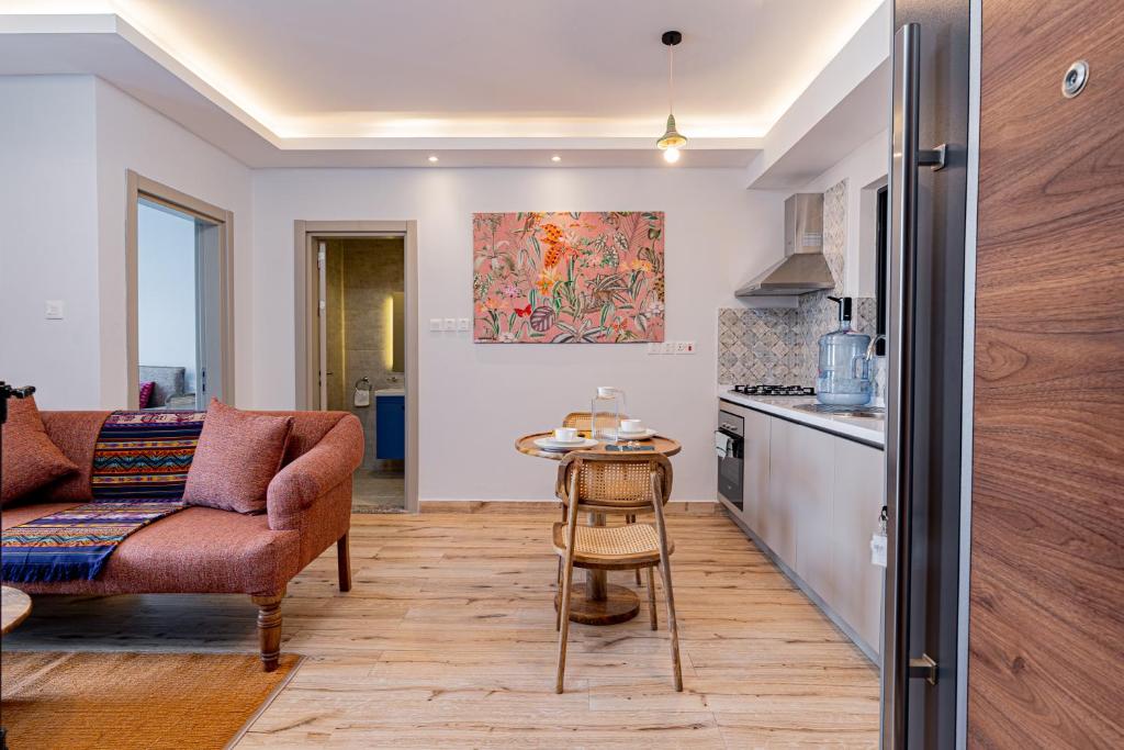Kuchyň nebo kuchyňský kout v ubytování Elite One Bedroom Apartment,Swimming pool, gym, workspace ,Wonderiss Homes close proximity to GTC, JW Mariott and Kempinski