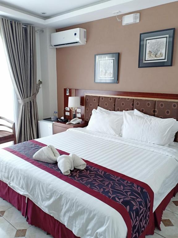 Postel nebo postele na pokoji v ubytování Marand Family Resort