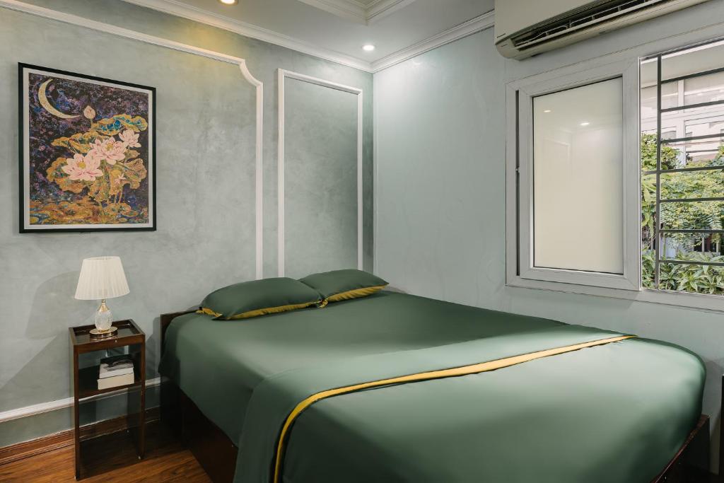Postel nebo postele na pokoji v ubytování Ledrum House - 50m to Hoan Kiem lake