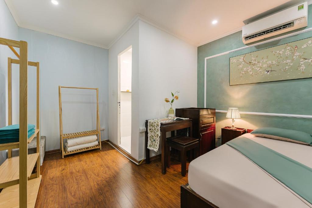 Postel nebo postele na pokoji v ubytování Ledrum House - 50m to Hoan Kiem lake