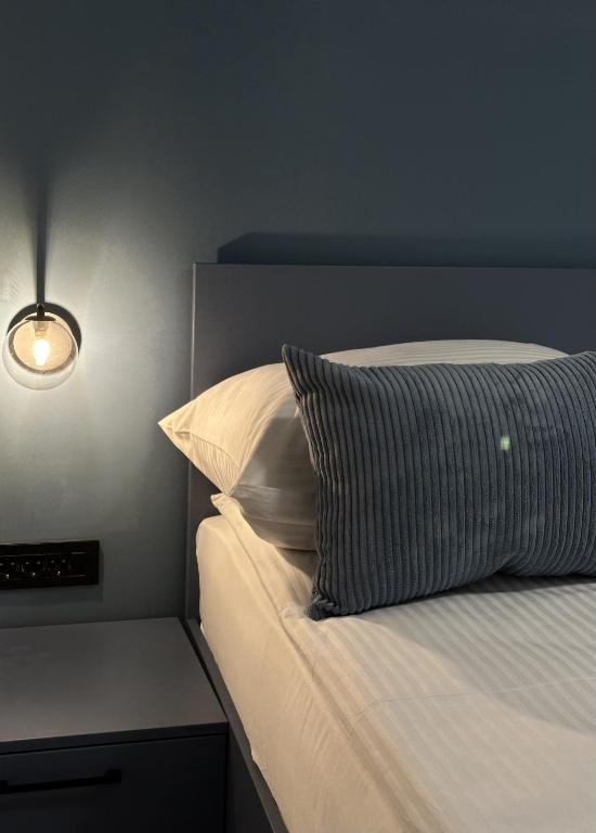 Postel nebo postele na pokoji v ubytování Alinar Oasis Apartments