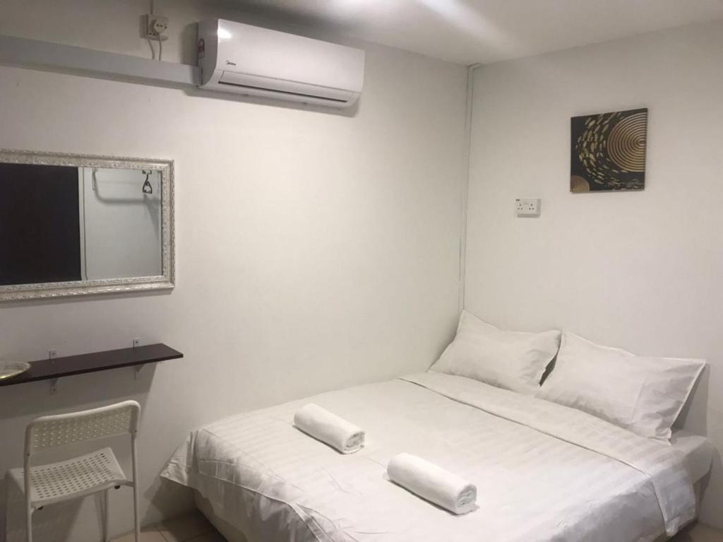 Postel nebo postele na pokoji v ubytování Hotel Seroja