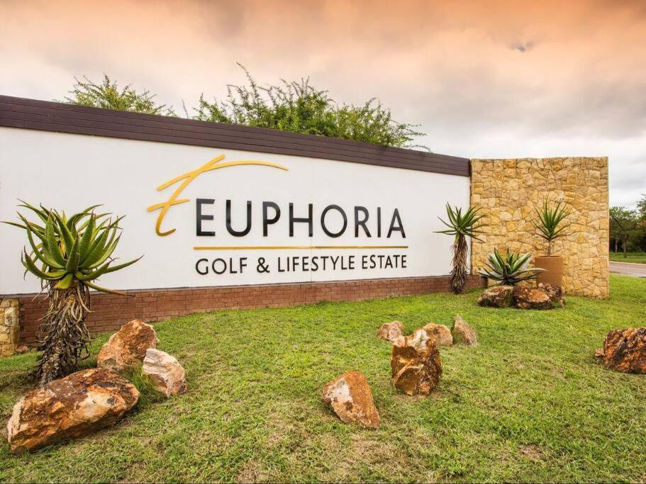a sign for the eureka golf and lifestyle centre at Euphoria Golf Estate House 196 Rooibok in Naboomspruit