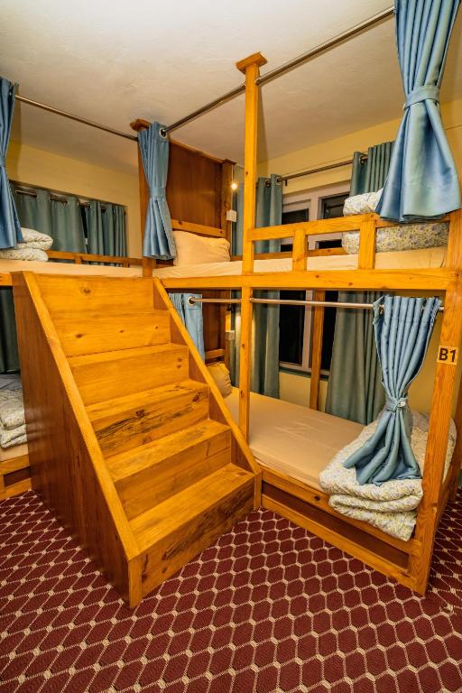 Postel nebo postele na pokoji v ubytování Kwabahal Boutique Hostel