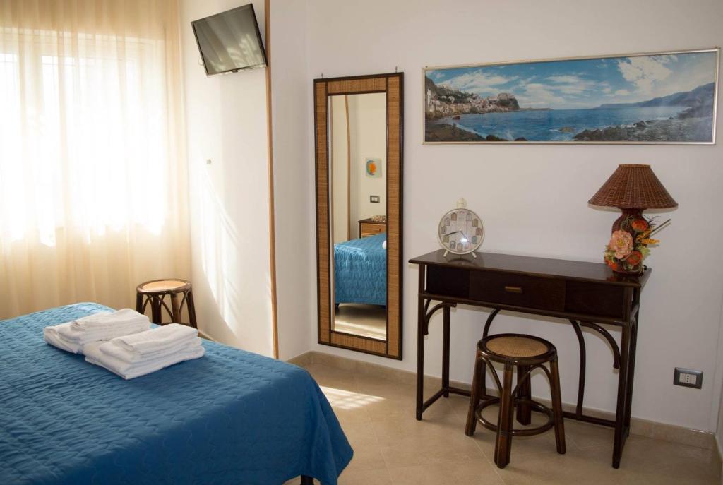 Postel nebo postele na pokoji v ubytování B&B Sunshine