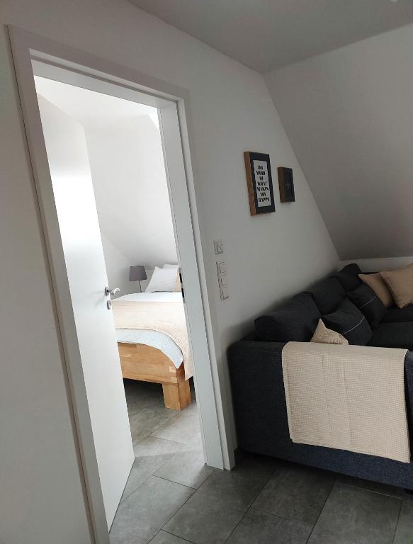 Postel nebo postele na pokoji v ubytování Ferienwohnung Scheib Aspach
