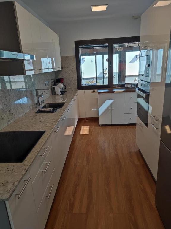 Kuchyň nebo kuchyňský kout v ubytování VILLA DREAMS - VILLAS LA ESTANCIA -