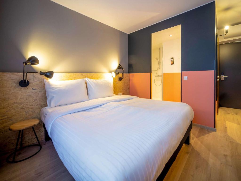 Postel nebo postele na pokoji v ubytování ibis Styles Wien Messe Prater