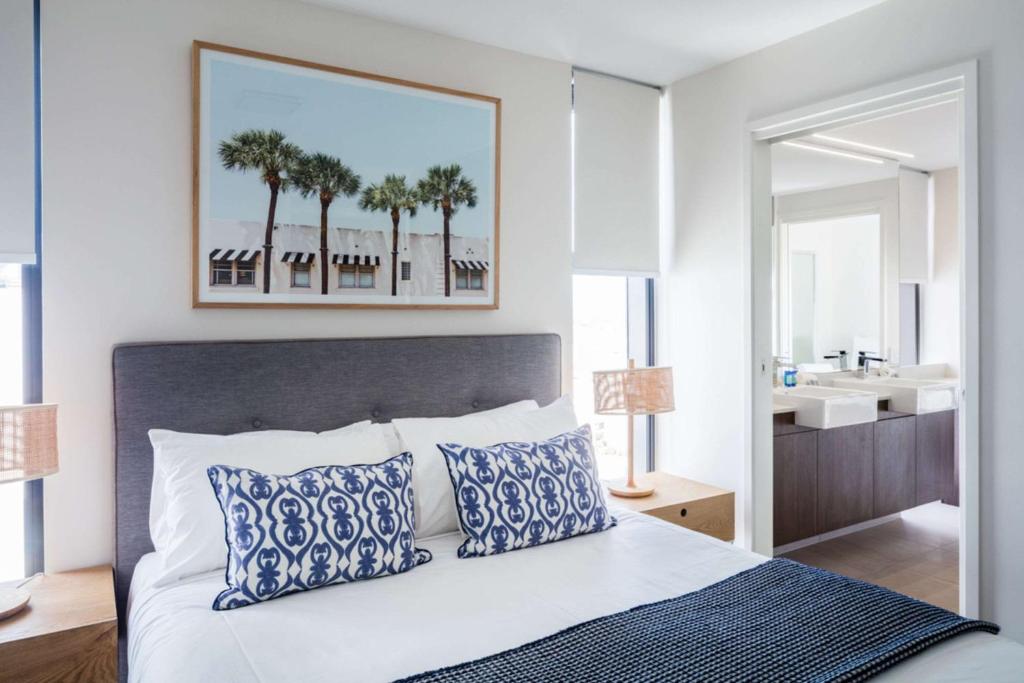 Postel nebo postele na pokoji v ubytování First Light Mooloolaba, Ascend Hotel Collection