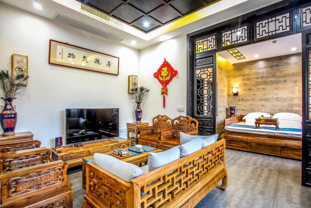 TV a/nebo společenská místnost v ubytování Pingyao Ziwenge Inn