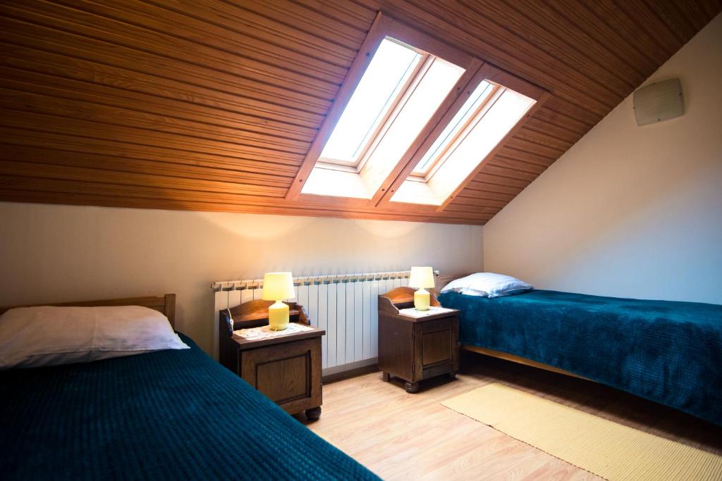 Posteľ alebo postele v izbe v ubytovaní Apartman Rudi