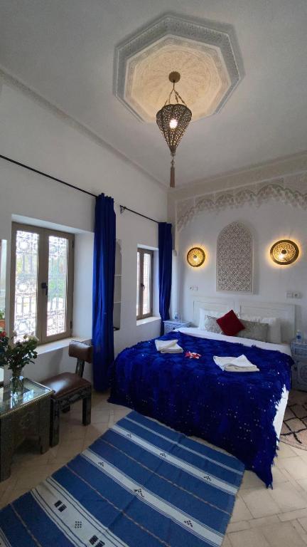 Postel nebo postele na pokoji v ubytování Riad Morocco Sky