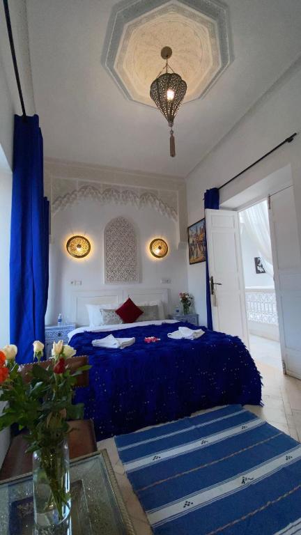 Postel nebo postele na pokoji v ubytování Riad Morocco Sky