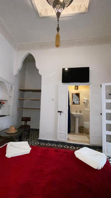 Postel nebo postele na pokoji v ubytování Riad Morocco Sky