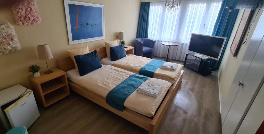 Postel nebo postele na pokoji v ubytování Zak Neuhausen
