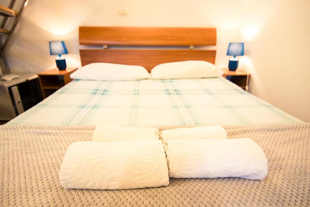 Posteľ alebo postele v izbe v ubytovaní Apartman Rudi
