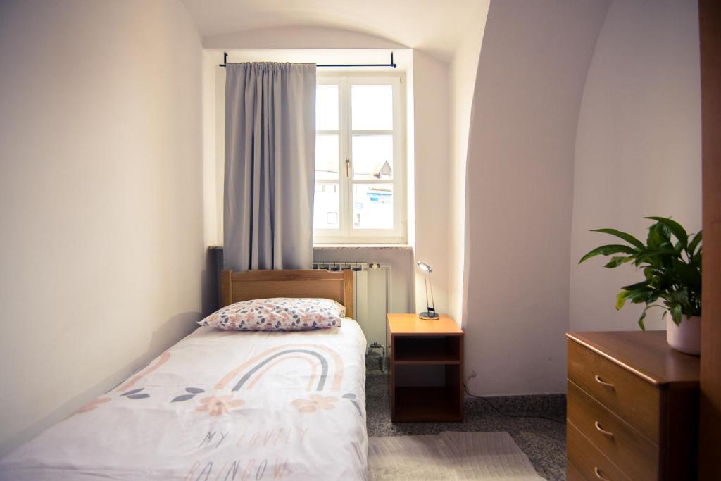 Posteľ alebo postele v izbe v ubytovaní Apartman Rudi