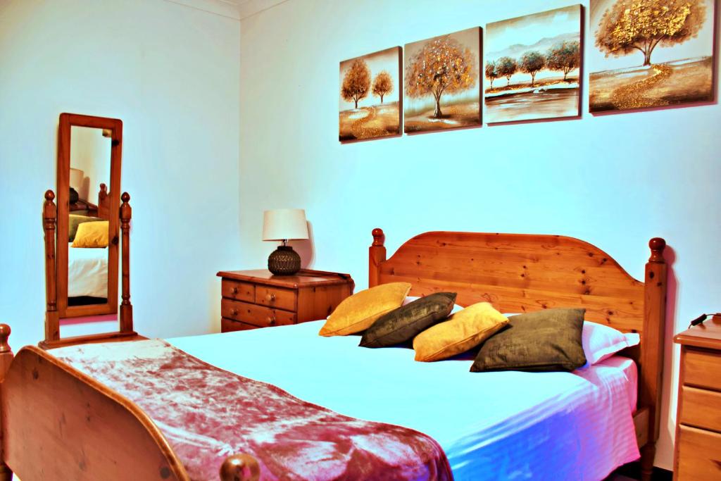 Postel nebo postele na pokoji v ubytování Green Grove Guest House