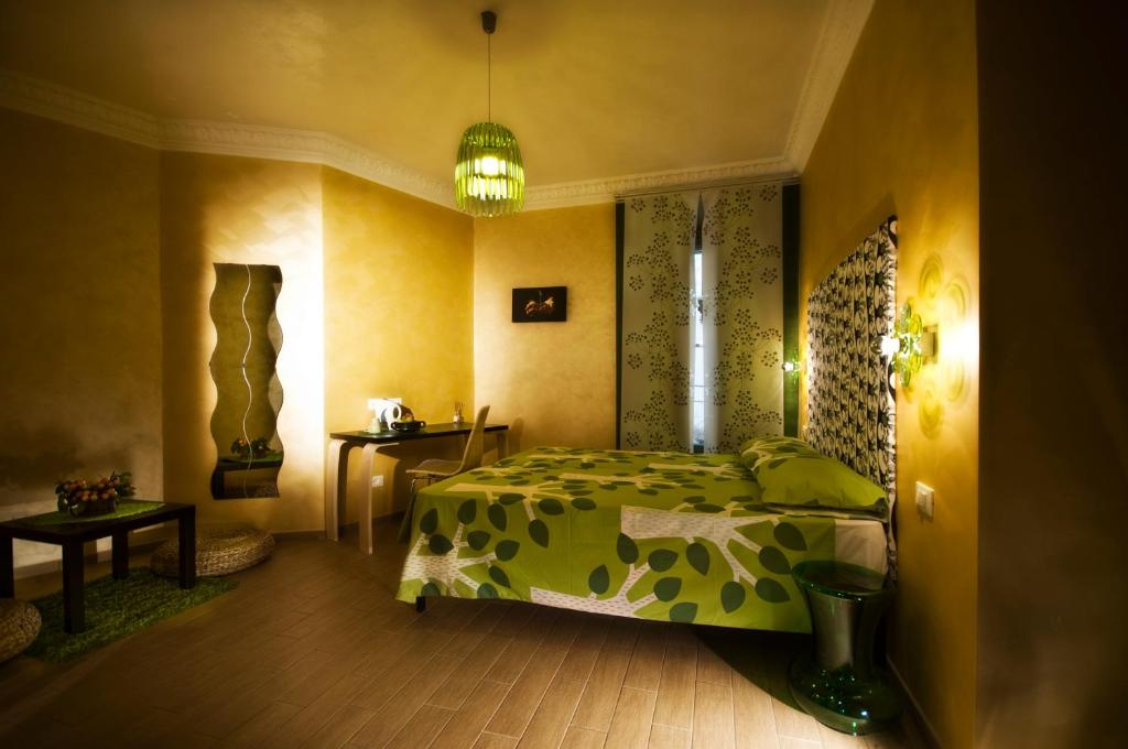 A bed or beds in a room at Domus Diana