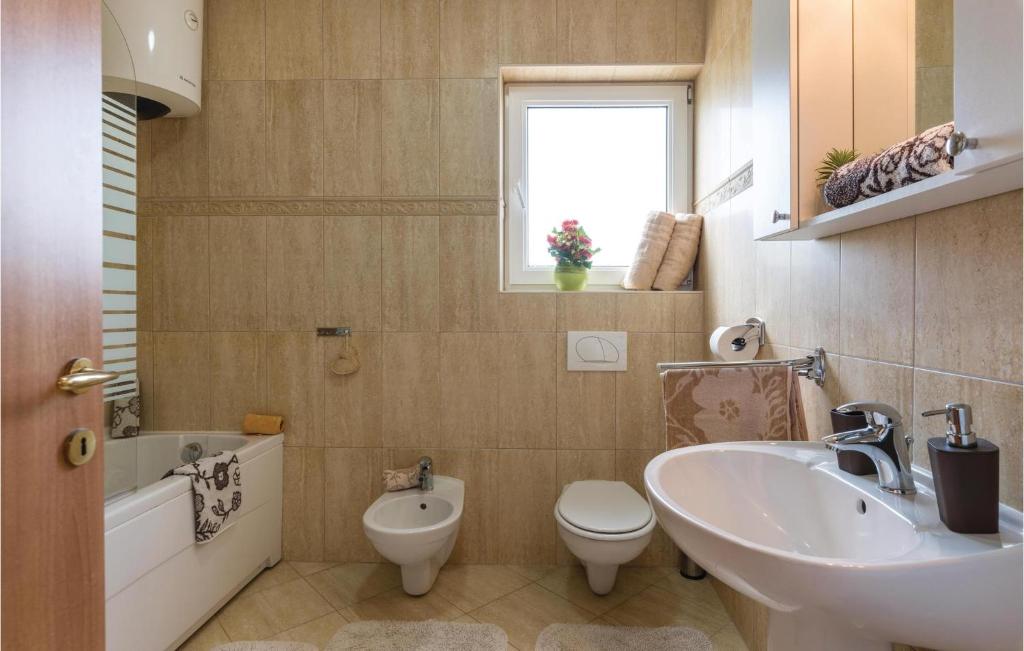 Kúpeľňa v ubytovaní Holiday Home Loborika 44