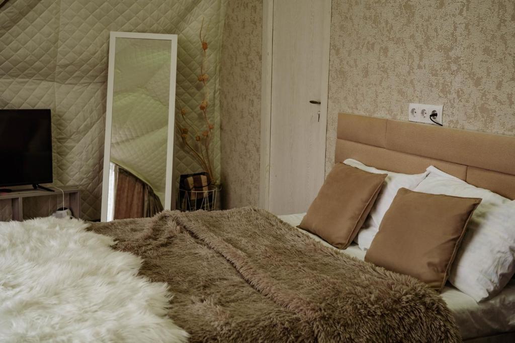 Postel nebo postele na pokoji v ubytování lakeviewglamp