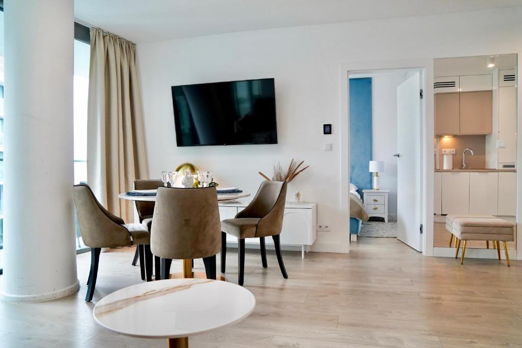 TV a/nebo společenská místnost v ubytování Wave by Baltic Home