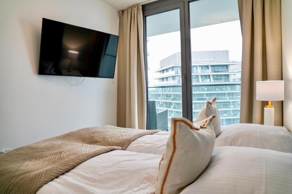 Postel nebo postele na pokoji v ubytování Wave by Baltic Home
