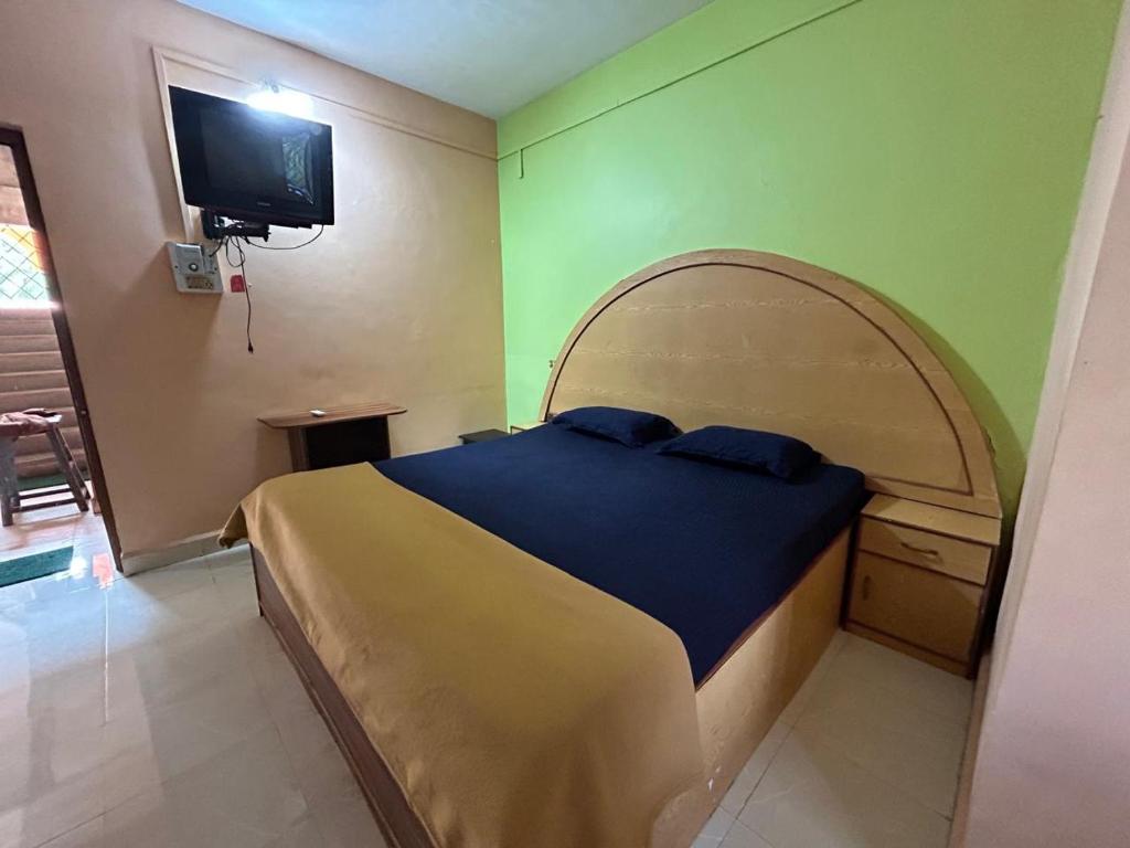 Postel nebo postele na pokoji v ubytování Casa guest house