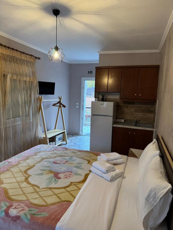 Postel nebo postele na pokoji v ubytování Agapi