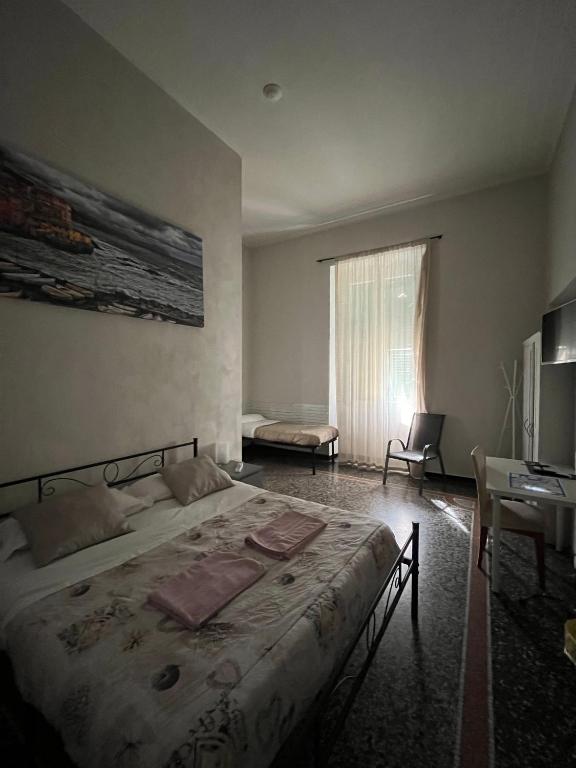 Postel nebo postele na pokoji v ubytování Le stanze della Lanterna
