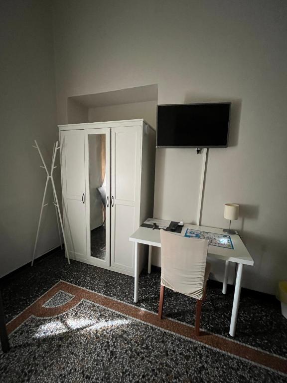 TV a/nebo společenská místnost v ubytování Le stanze della Lanterna