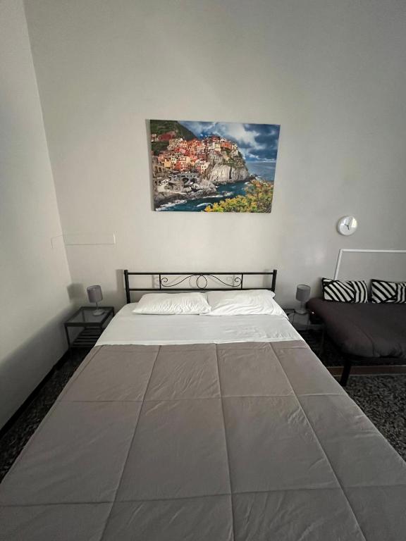 Postel nebo postele na pokoji v ubytování Le stanze della Lanterna