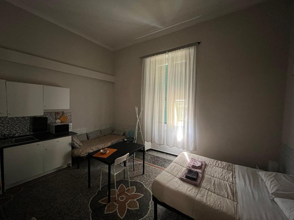 Postel nebo postele na pokoji v ubytování Le stanze della Lanterna