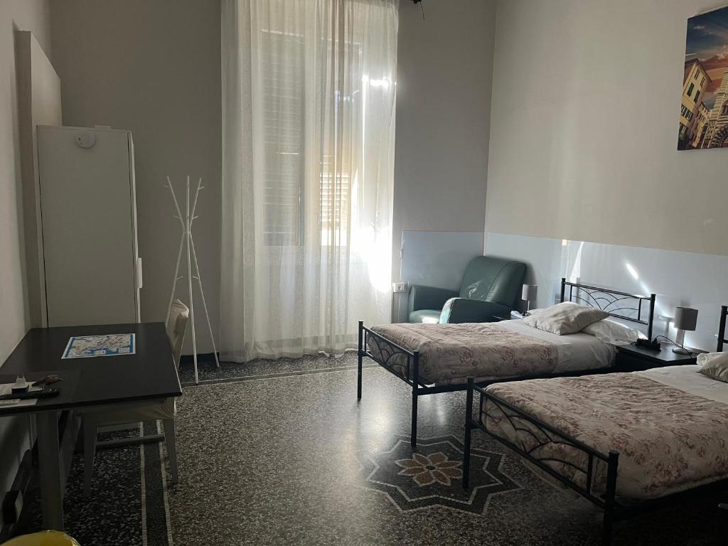 Postel nebo postele na pokoji v ubytování Le stanze della Lanterna
