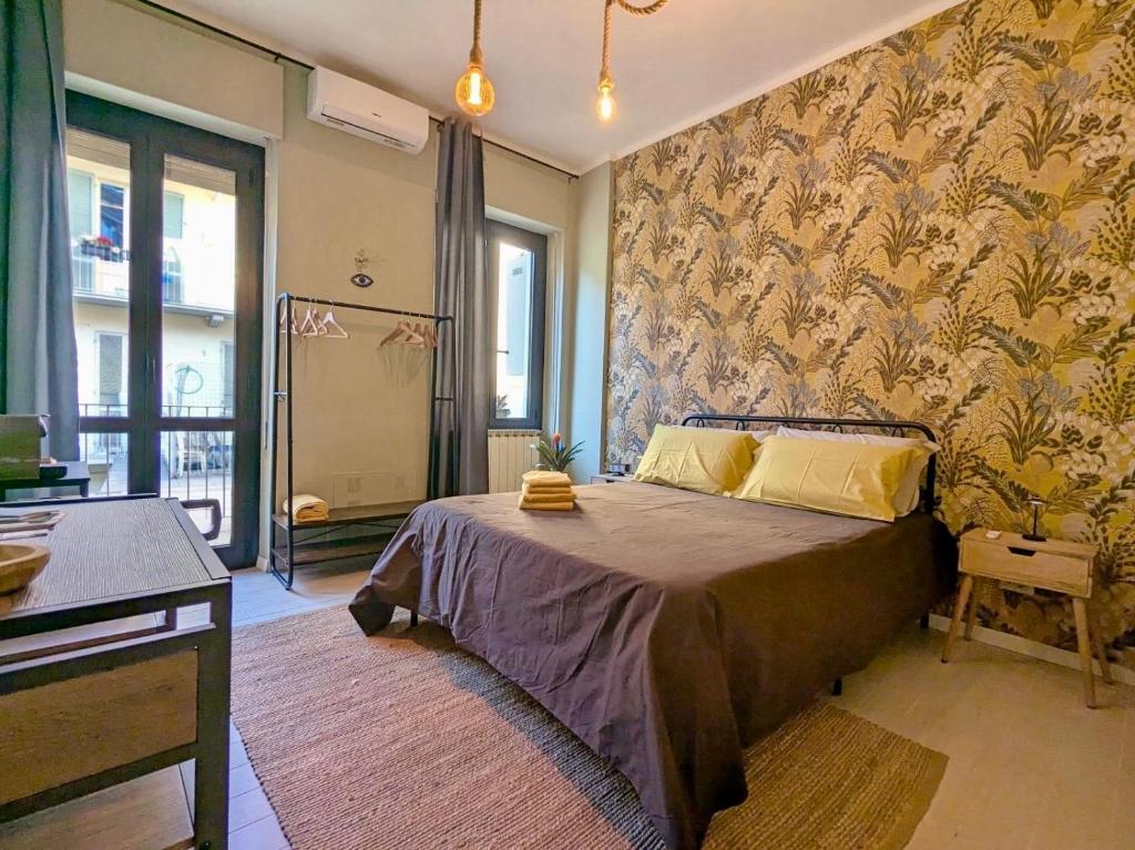 Postel nebo postele na pokoji v ubytování RO-MI Room
