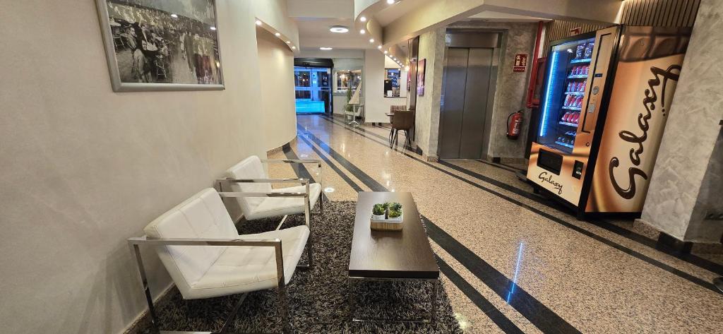 A seating area at Hotel Nuevo Triunfo
