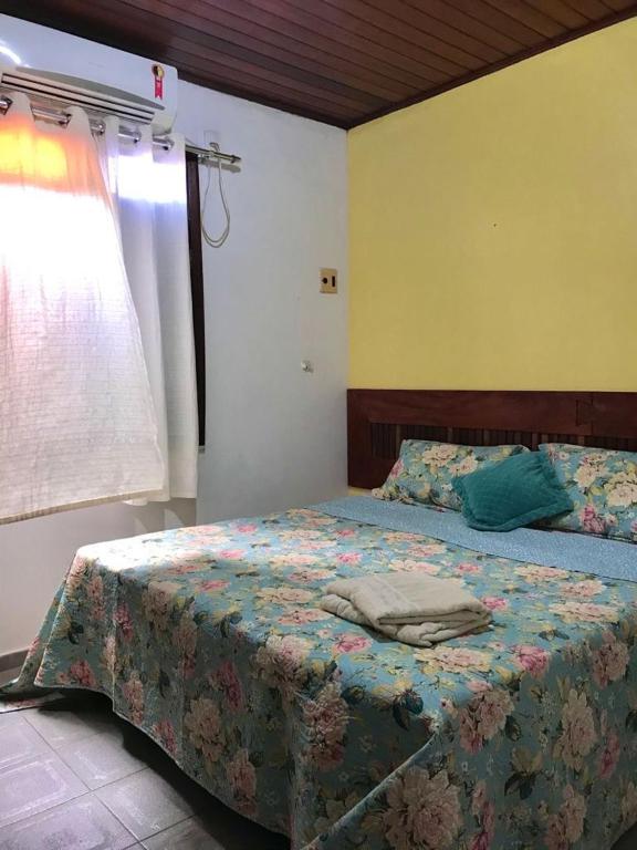 Postel nebo postele na pokoji v ubytování Pousada Morro Bello