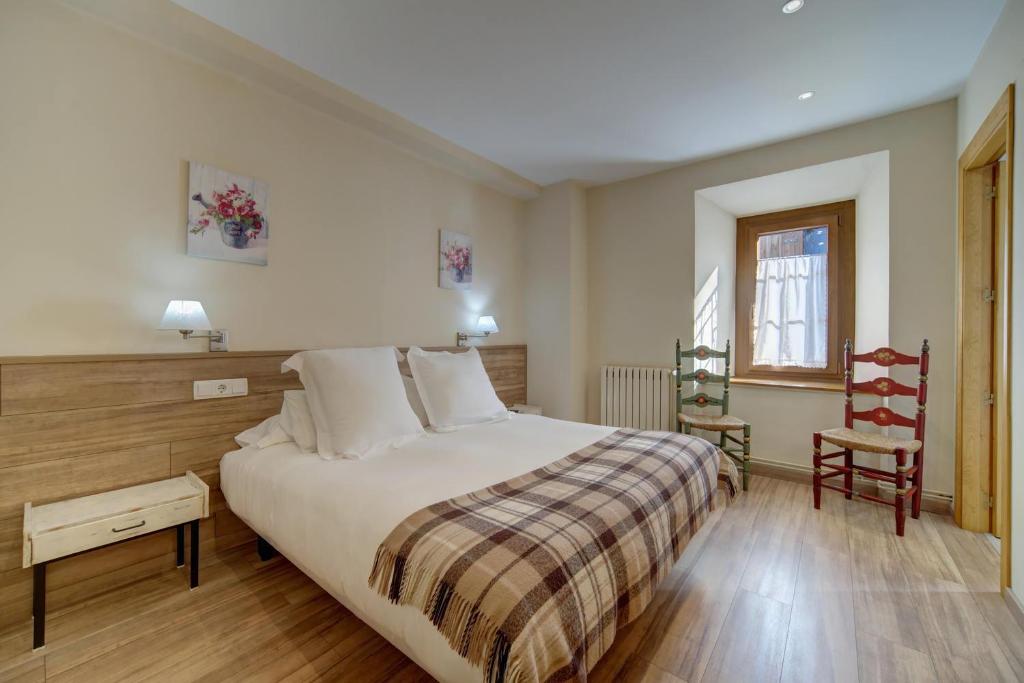 Postel nebo postele na pokoji v ubytování Casa Jansú