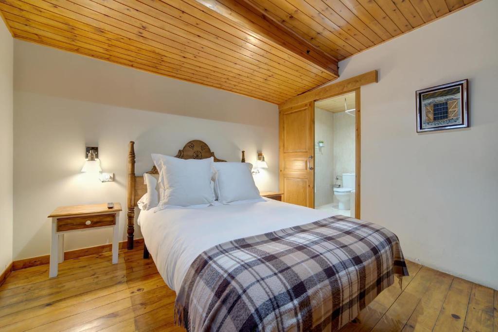Postel nebo postele na pokoji v ubytování Casa Jansú