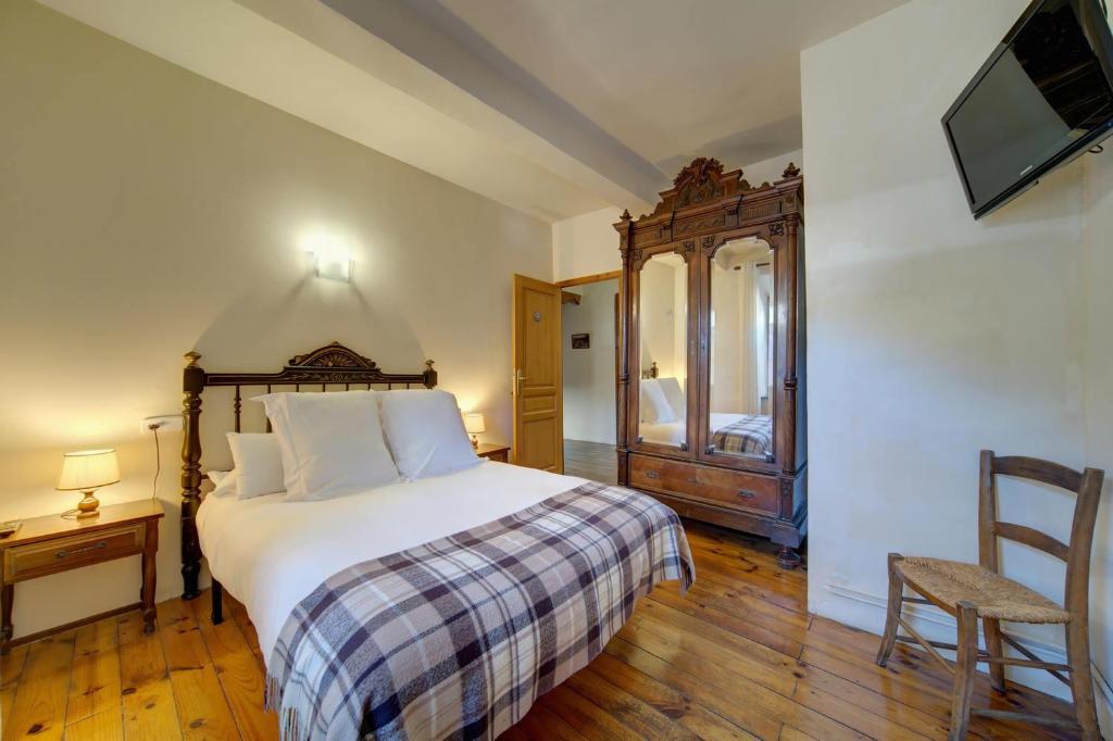 Postel nebo postele na pokoji v ubytování Casa Jansú