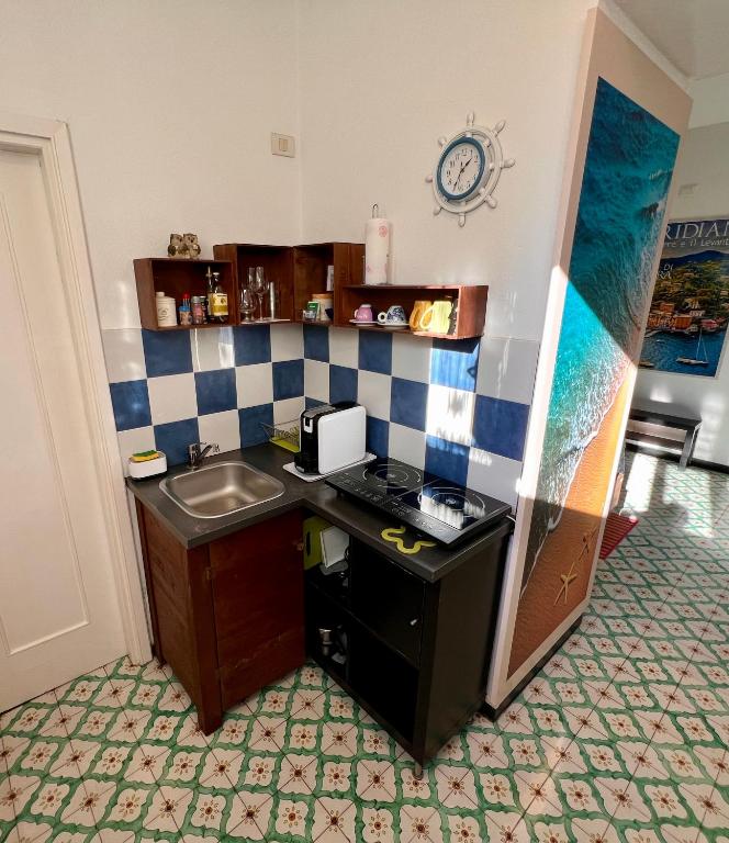 Kuchyň nebo kuchyňský kout v ubytování B&B Ladidi
