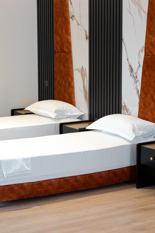Postel nebo postele na pokoji v ubytování Oxygen Boutique Hotel
