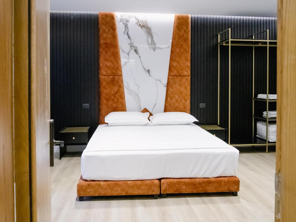Postel nebo postele na pokoji v ubytování Oxygen Boutique Hotel