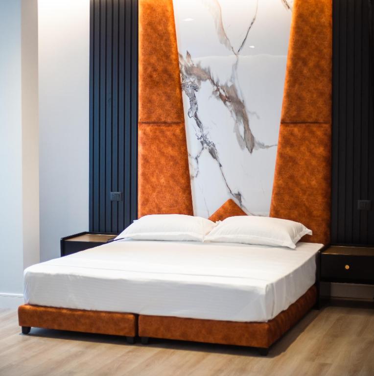 Postel nebo postele na pokoji v ubytování Oxygen Boutique Hotel