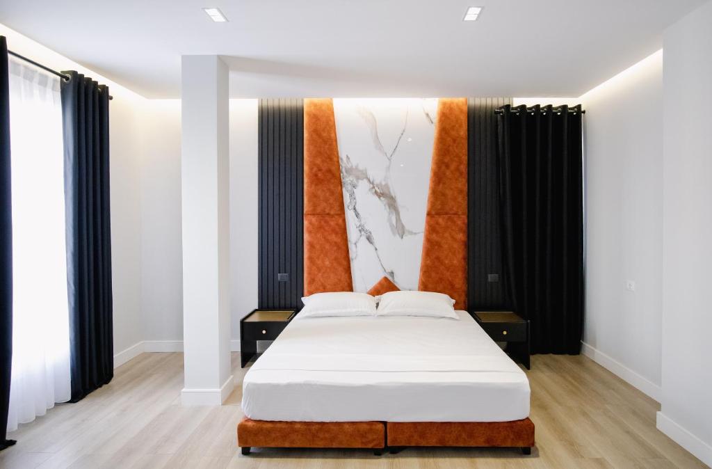 Postel nebo postele na pokoji v ubytování Oxygen Boutique Hotel