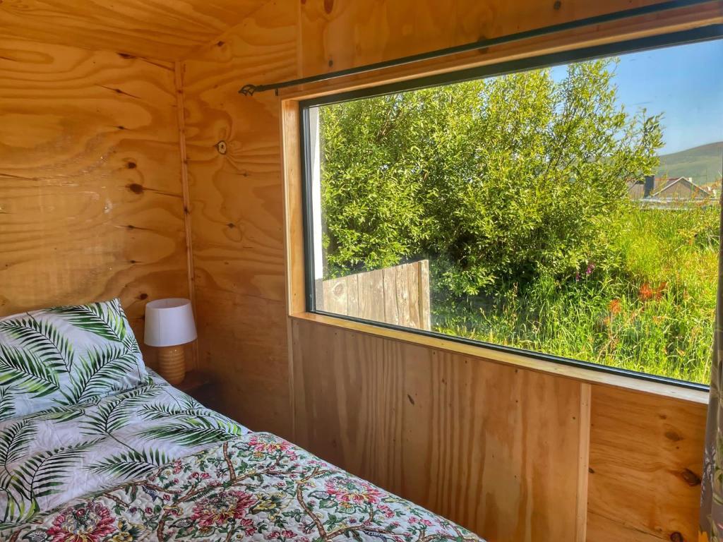 Postel nebo postele na pokoji v ubytování Valentia Island Escape