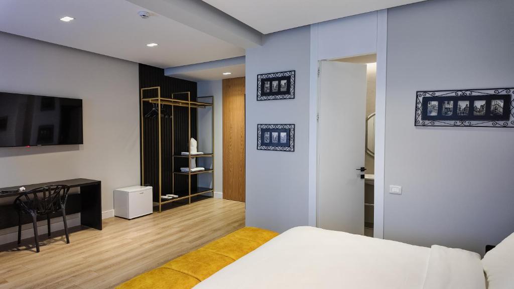 Postel nebo postele na pokoji v ubytování Oxygen Boutique Hotel