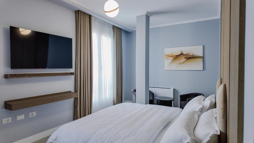 Postel nebo postele na pokoji v ubytování Oxygen Boutique Hotel