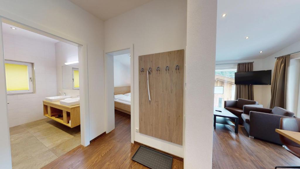 Posteľ alebo postele v izbe v ubytovaní Appartement Kitzsteinhorn -Summercard included
